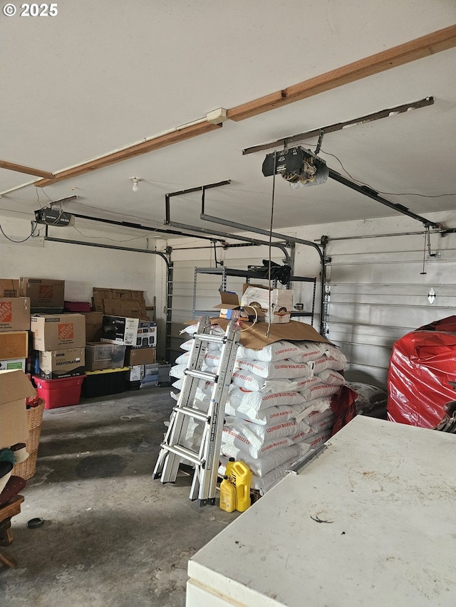 garage featuring a garage door opener