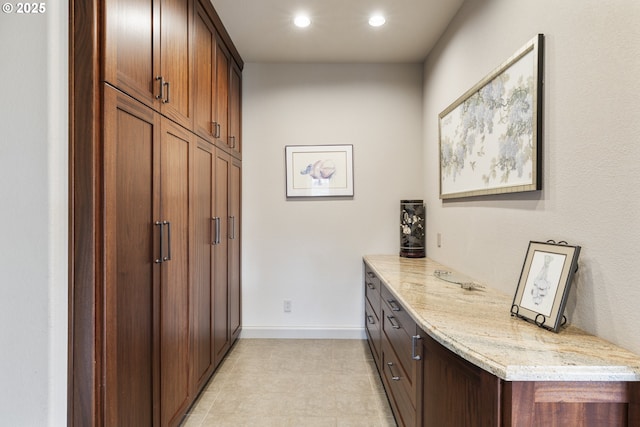 interior space featuring light tile patterned floors