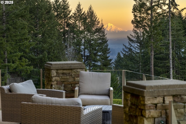 view of patio terrace at dusk