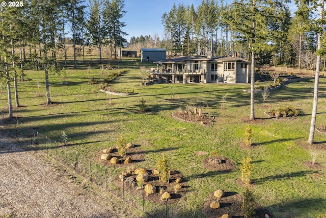 view of yard with a rural view