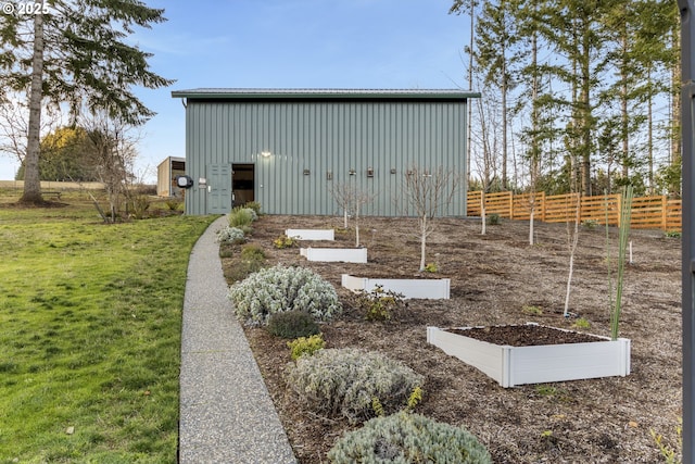 view of outdoor structure with a lawn