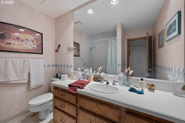 full bath featuring vanity, visible vents, curtained shower, tile walls, and toilet