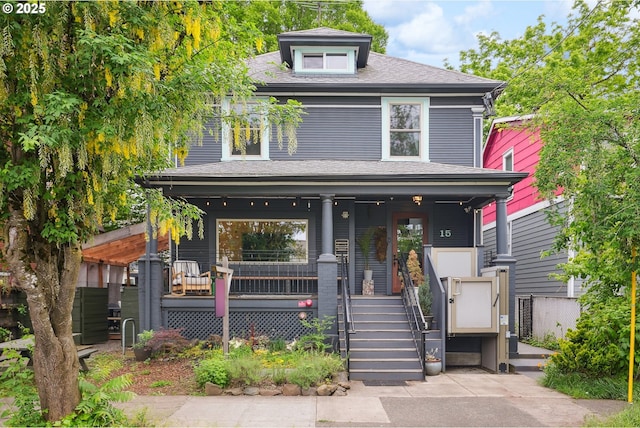 15 NE 18th Ave, Portland, OR 97232 - american foursquare style home featuring covered porch and a shingled roof