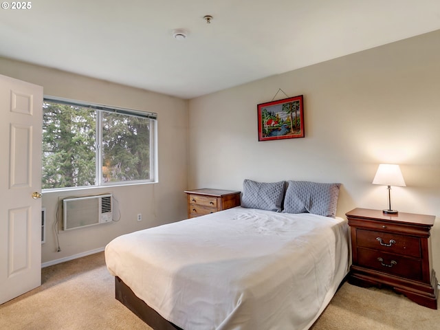 carpeted bedroom with a wall mounted AC