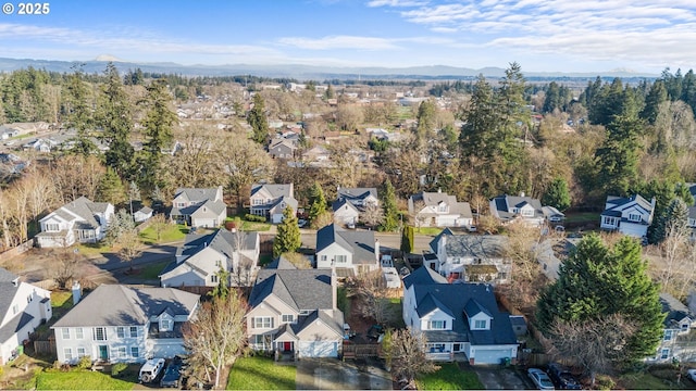 bird's eye view with a mountain view