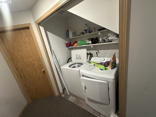 washroom with washer and clothes dryer