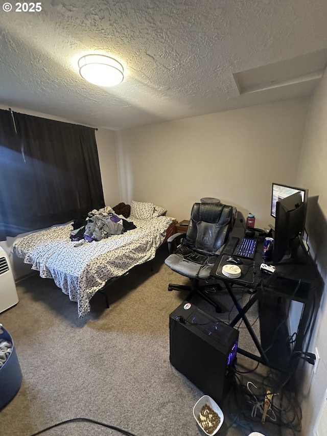 carpeted bedroom featuring a textured ceiling