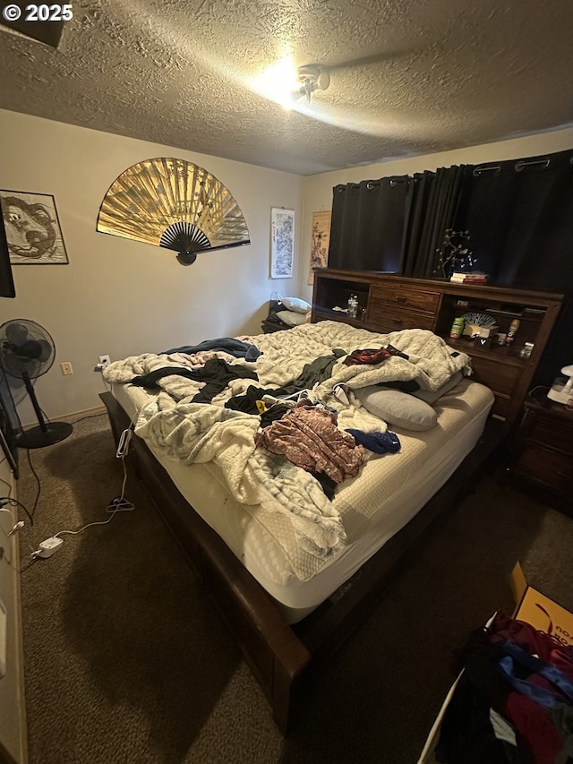 carpeted bedroom featuring a textured ceiling