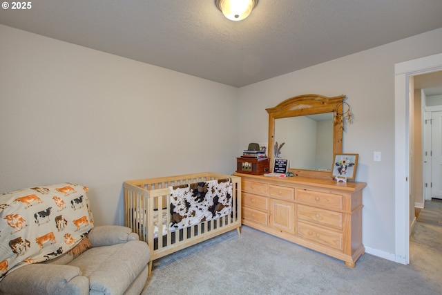 carpeted bedroom with a textured ceiling