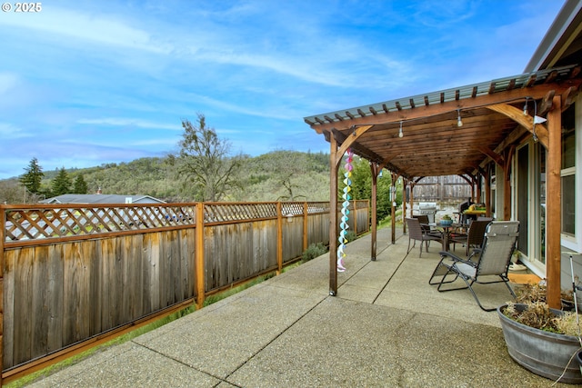 view of patio / terrace featuring a pergola