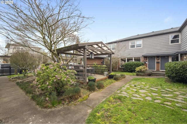 view of yard featuring a deck and fence