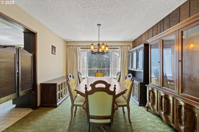 28410 S Beavercreek Rd, Mulino, OR 97042 - dining room featuring a chandelier, light colored carpet, and a textured ceiling