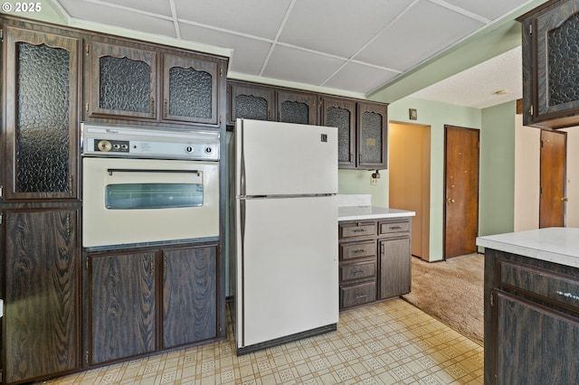 28410 S Beavercreek Rd, Mulino, OR 97042 - kitchen with white appliances, dark brown cabinets, and light countertops