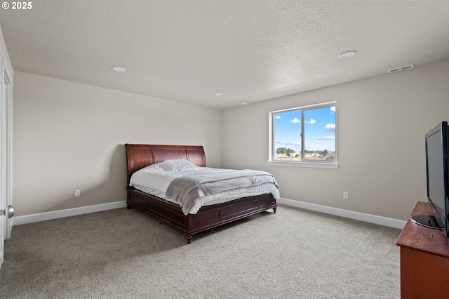 carpeted bedroom with recessed lighting, baseboards, visible vents, and a textured ceiling