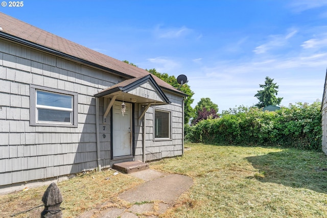 173 N Seneca Rd, Eugene, OR 97402 - property entrance with a lawn