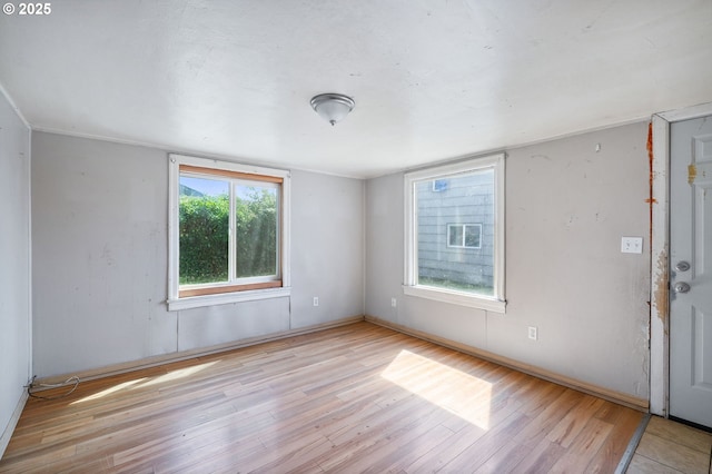 173 N Seneca Rd, Eugene, OR 97402 - spare room featuring wood finished floors and baseboards