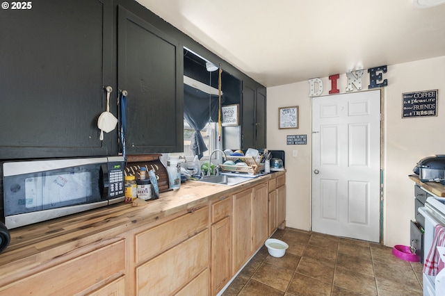 173 N Seneca Rd, Eugene, OR 97402 - kitchen featuring stainless steel microwave and light brown cabinetry