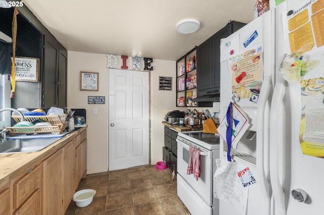 173 N Seneca Rd, Eugene, OR 97402 - kitchen with white appliances and under cabinet range hood