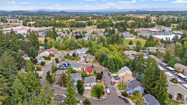 aerial view with a mountain view and a residential view