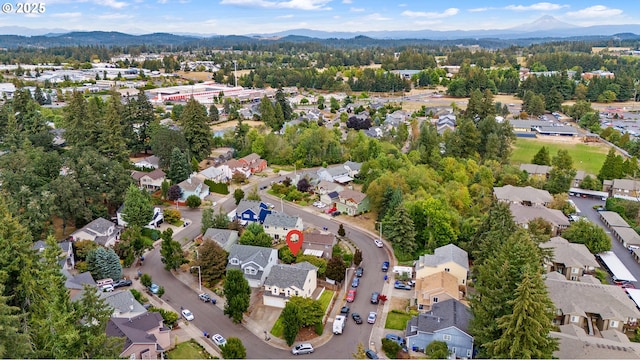 bird's eye view featuring a mountain view and a residential view