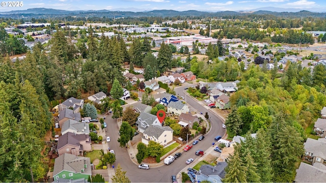 bird's eye view featuring a residential view and a mountain view