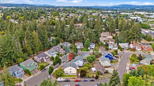 bird's eye view with a mountain view and a residential view