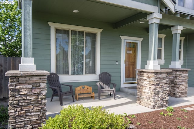 view of patio featuring a porch