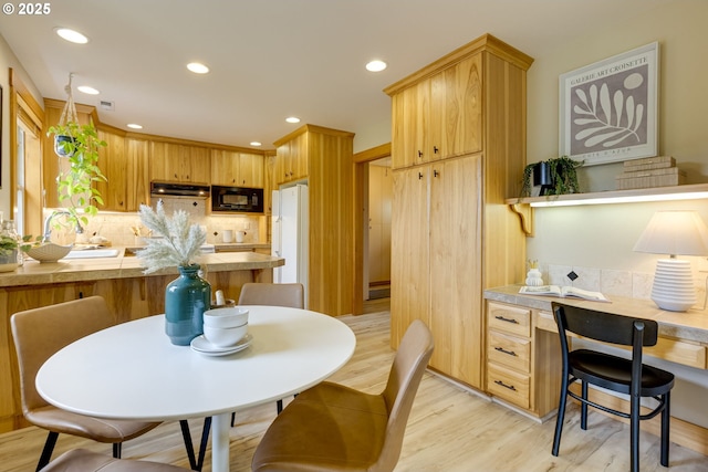 5818 SW Boundary St, Portland, OR 97221 - dining area with recessed lighting and light wood-type flooring