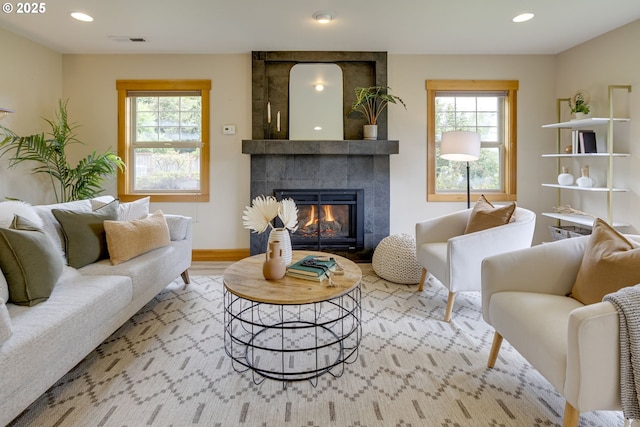5818 SW Boundary St, Portland, OR 97221 - living room with a fireplace, plenty of natural light, recessed lighting, and wood finished floors