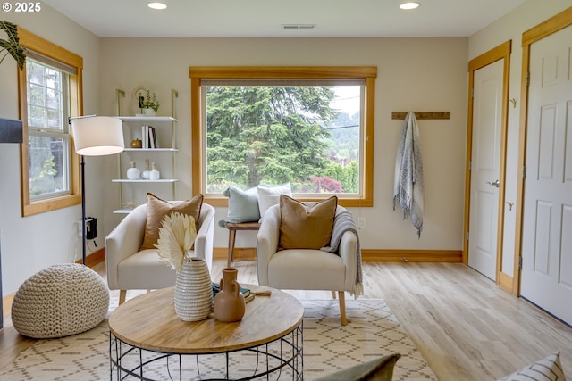 5818 SW Boundary St, Portland, OR 97221 - living area with light wood-type flooring, plenty of natural light, baseboards, and recessed lighting