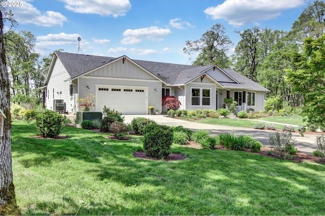 view of front of house featuring a garage, a front yard, roof with shingles, board and batten siding, and concrete driveway