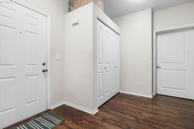 entrance foyer featuring dark hardwood / wood-style flooring