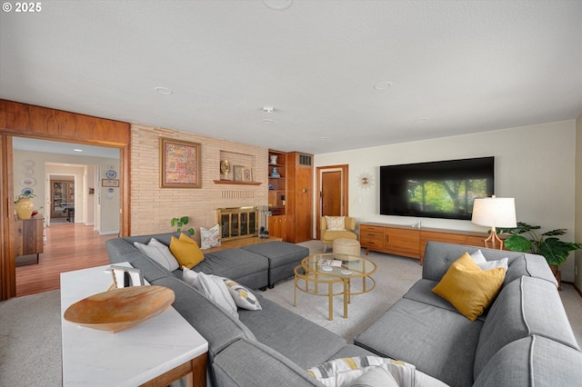 living room featuring a fireplace
