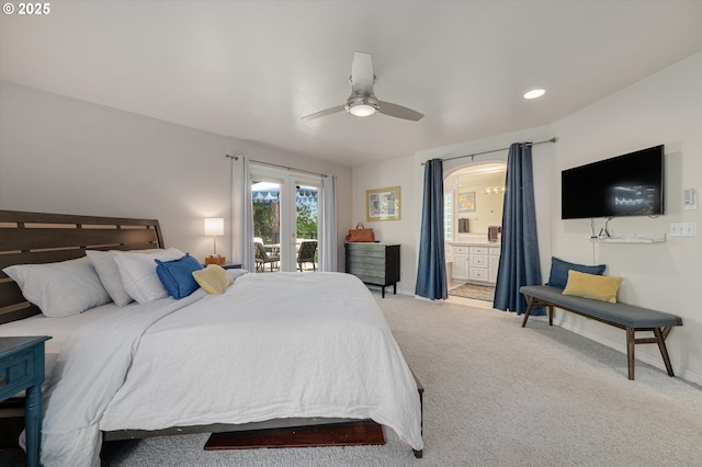 carpeted bedroom with access to outside, ensuite bath, a ceiling fan, recessed lighting, and baseboards