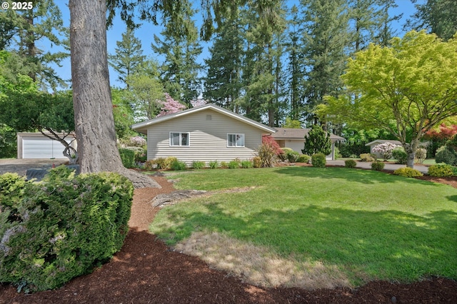 view of yard featuring a garage