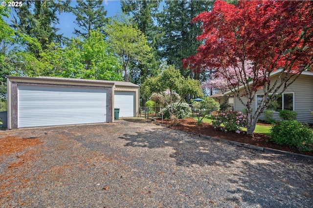 detached garage with fence