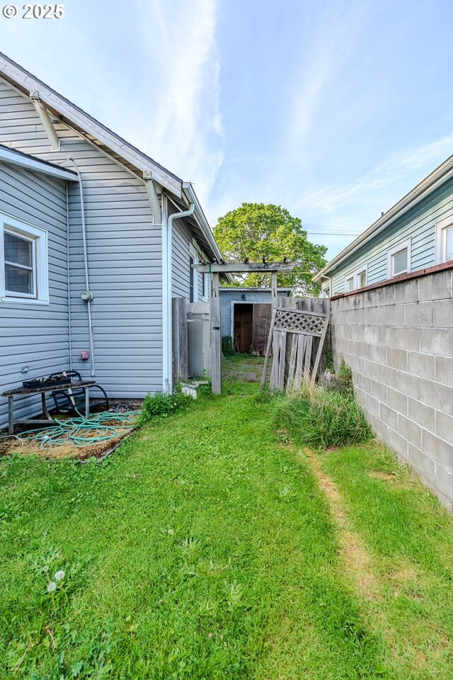 view of yard featuring fence