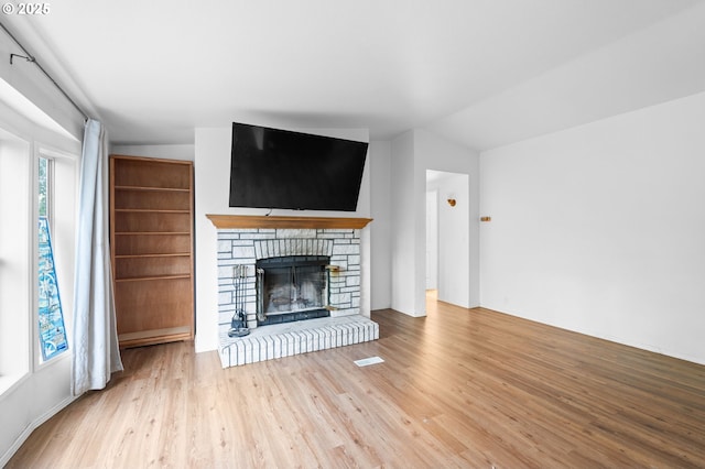 33385 Craig Loop, Cottage Grove, OR 97424 - unfurnished living room with wood finished floors and a fireplace
