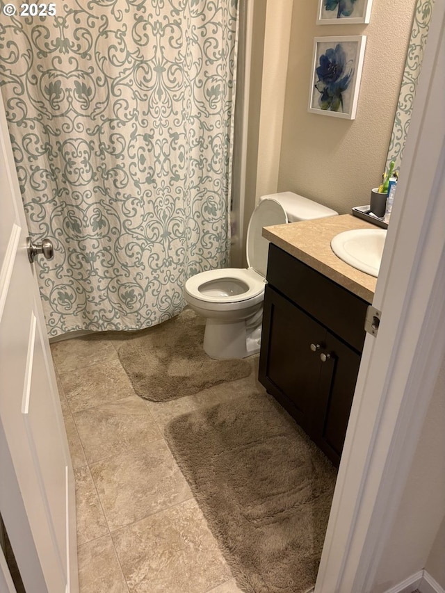 13622 SE Siskin Ln, Happy Valley, OR 97015 - bathroom featuring vanity, stone finish floors, and a shower with curtain