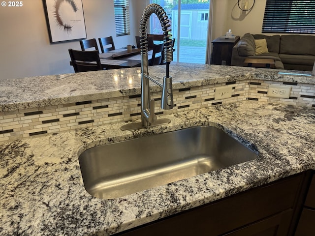 13622 SE Siskin Ln, Happy Valley, OR 97015 - kitchen view of a sink and light stone countertops