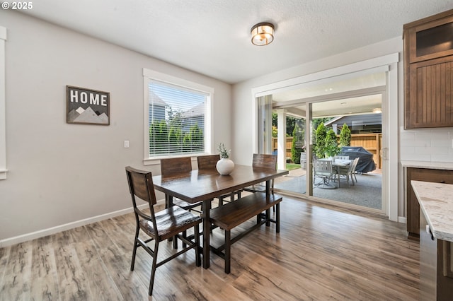 12209 Mimosa Way, Oregon City, OR 97045 - dining room featuring wood finished floors and baseboards