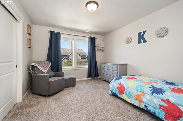 12209 Mimosa Way, Oregon City, OR 97045 - carpeted bedroom with baseboards and a closet