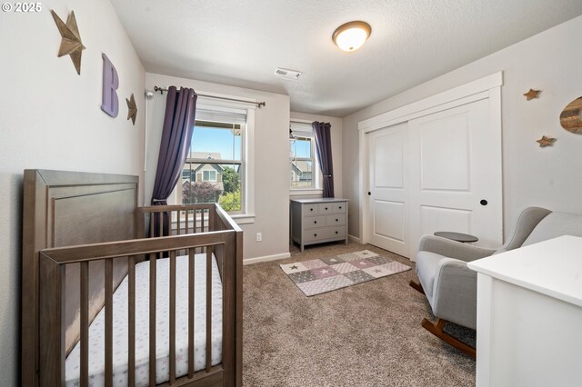 12209 Mimosa Way, Oregon City, OR 97045 - bedroom featuring a closet, carpet flooring, and baseboards