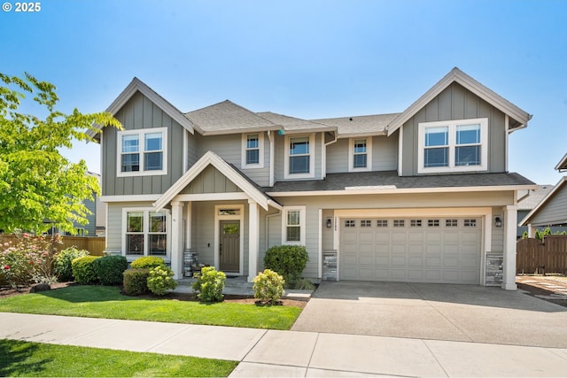 12209 Mimosa Way, Oregon City, OR 97045 - view of front facade with board and batten siding, a garage, and driveway