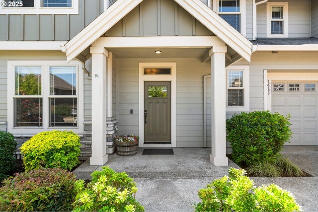 12209 Mimosa Way, Oregon City, OR 97045 - property entrance featuring board and batten siding and a porch