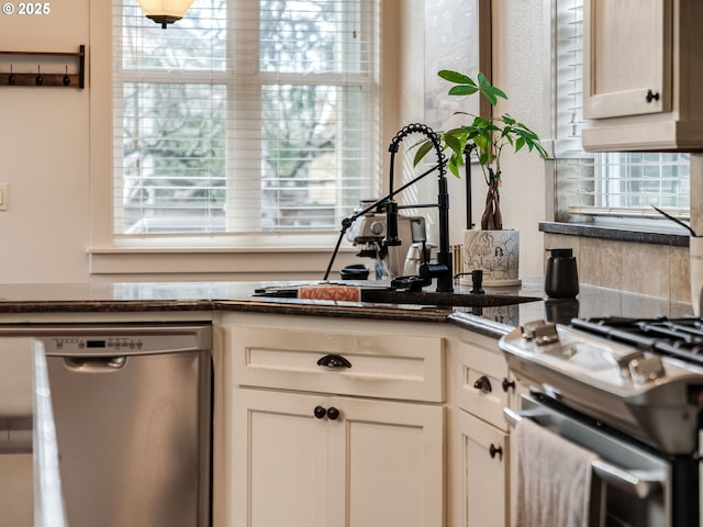 kitchen featuring stainless steel appliances and sink