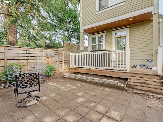 view of patio with a wooden deck