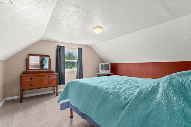 26011 S Morgan Rd, Estacada, OR 97023 - bedroom with vaulted ceiling, a textured ceiling, baseboards, and carpet flooring