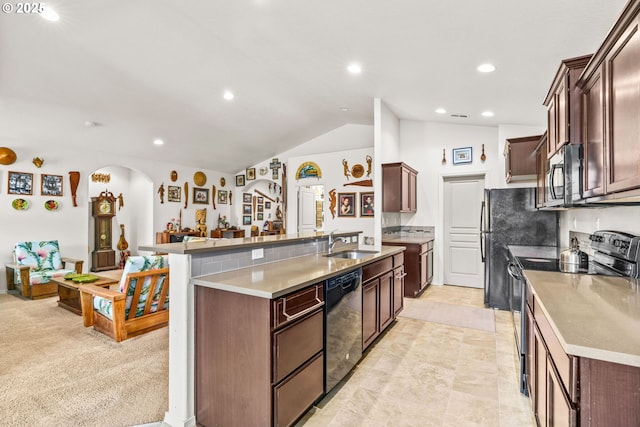 5739 Donohoe Ave, Eugene, OR 97402 - kitchen with electric range, dishwashing machine, stainless steel microwave, open floor plan, and lofted ceiling