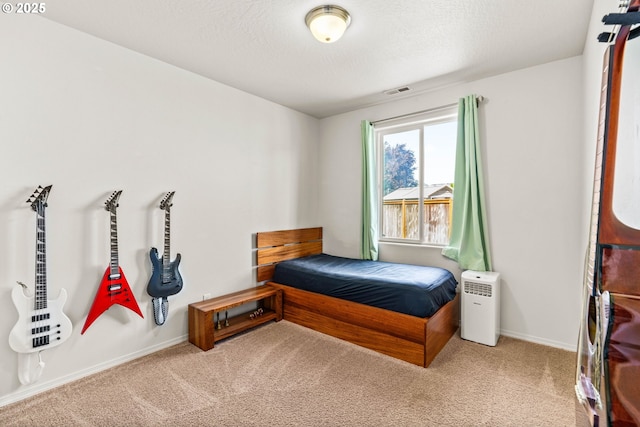 5739 Donohoe Ave, Eugene, OR 97402 - bedroom with carpet flooring and a textured ceiling